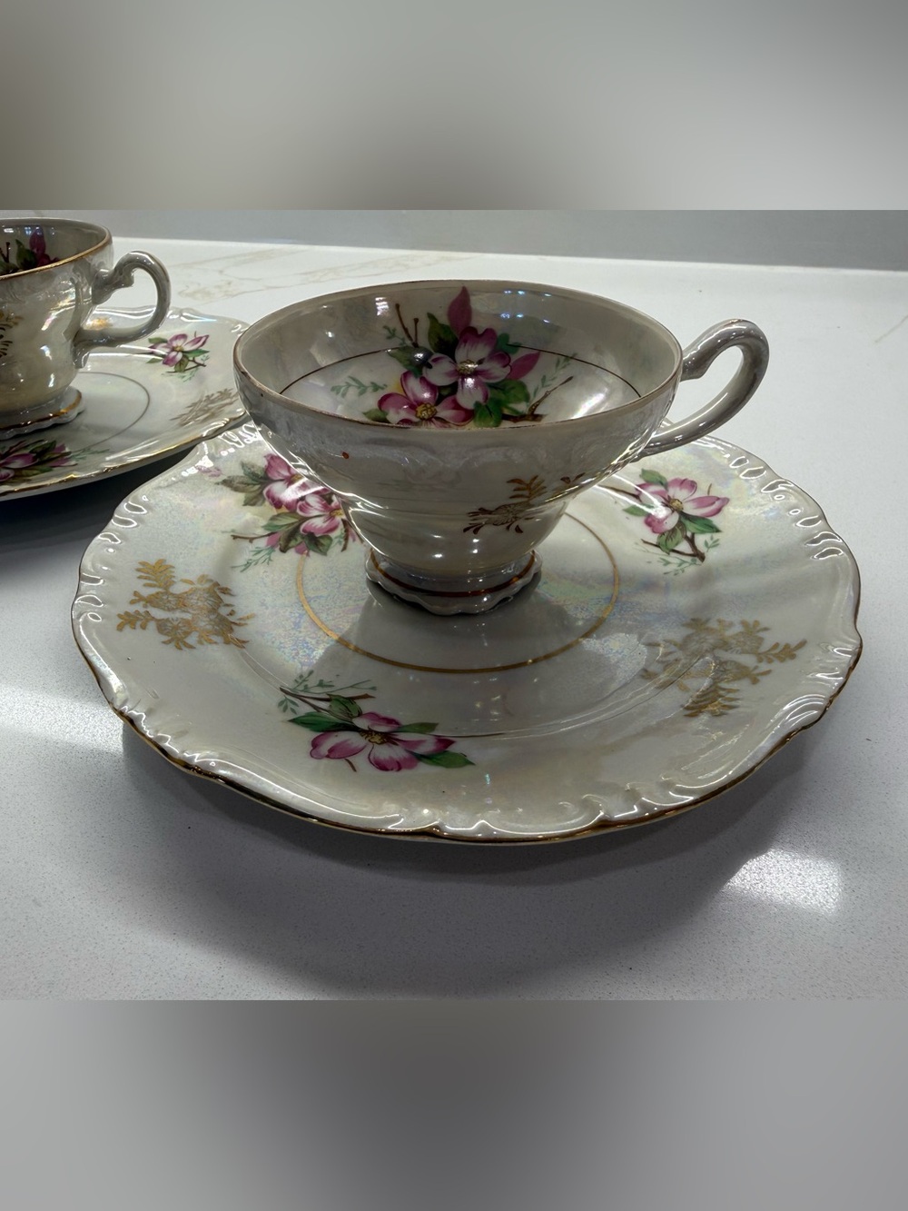 Vintage Pearlescent Teacup and Saucer set with Pink Dogwood flowers.